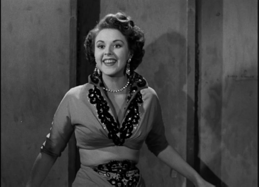 眠りなき街の画像