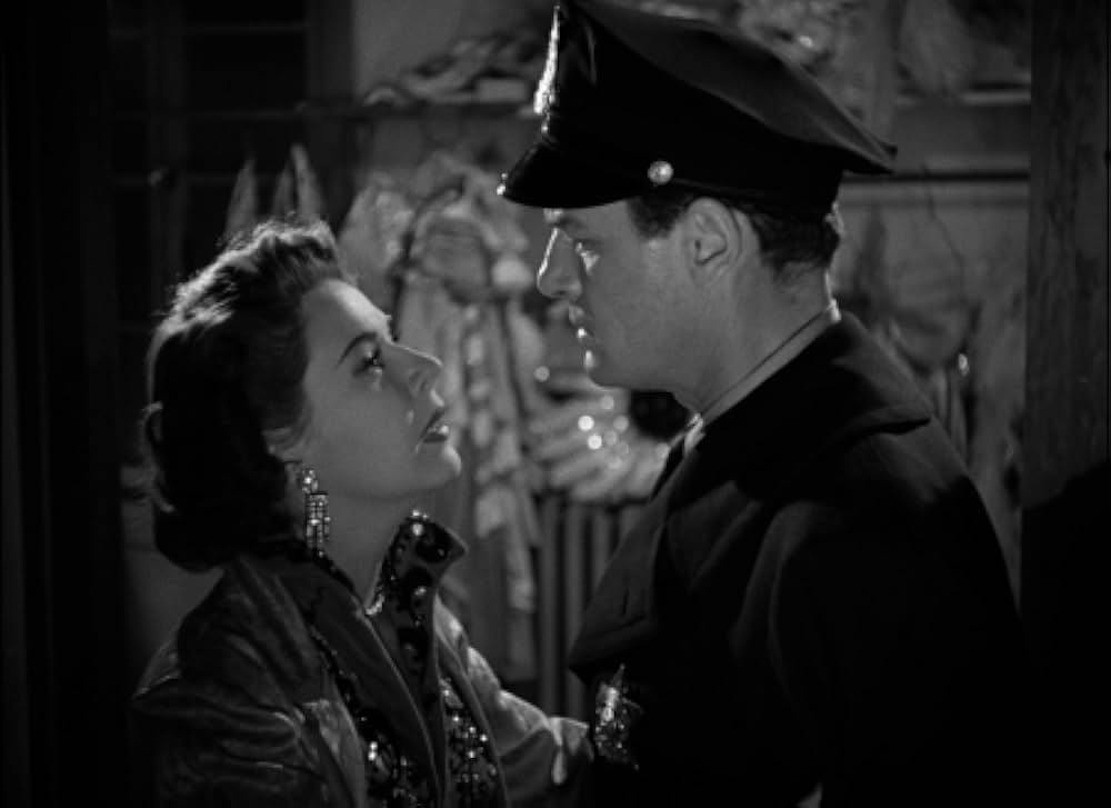 眠りなき街の画像