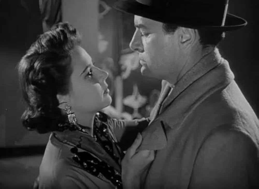 眠りなき街の画像