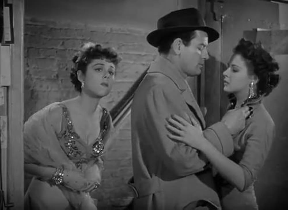 眠りなき街の画像