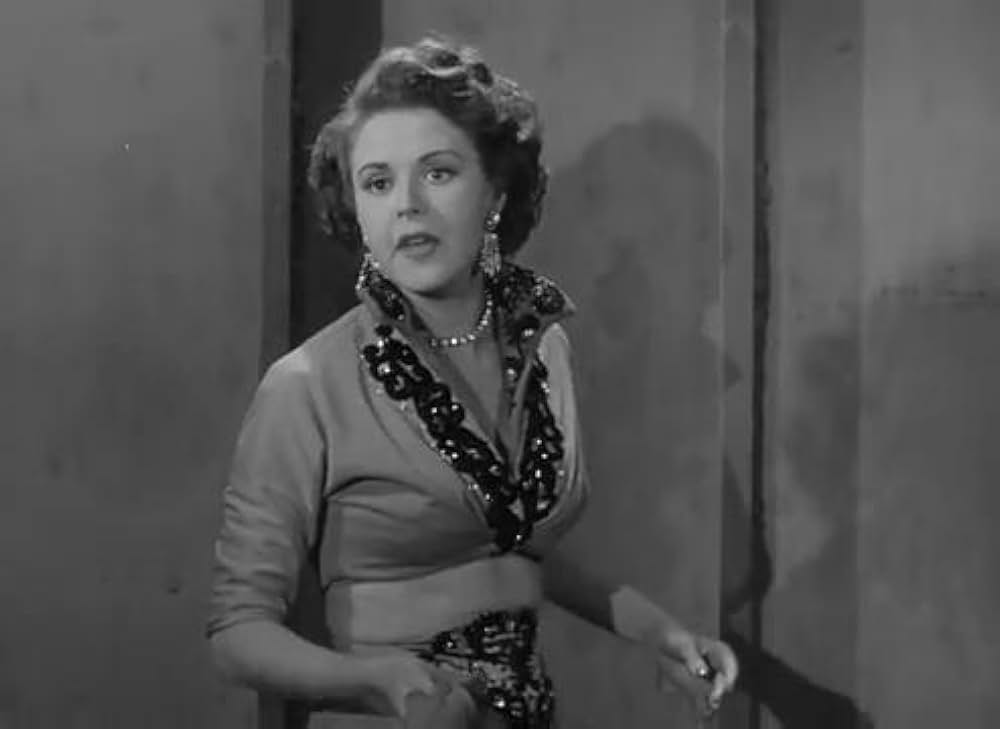 眠りなき街の画像