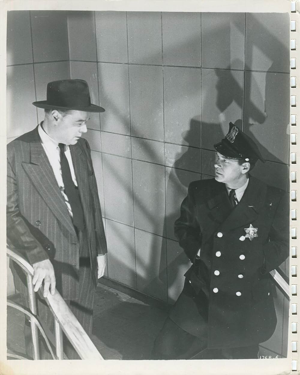 眠りなき街の画像