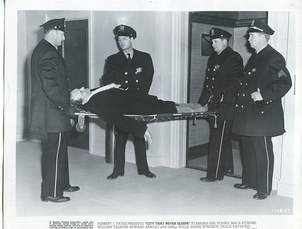 眠りなき街の画像