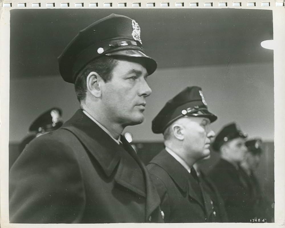 眠りなき街の画像