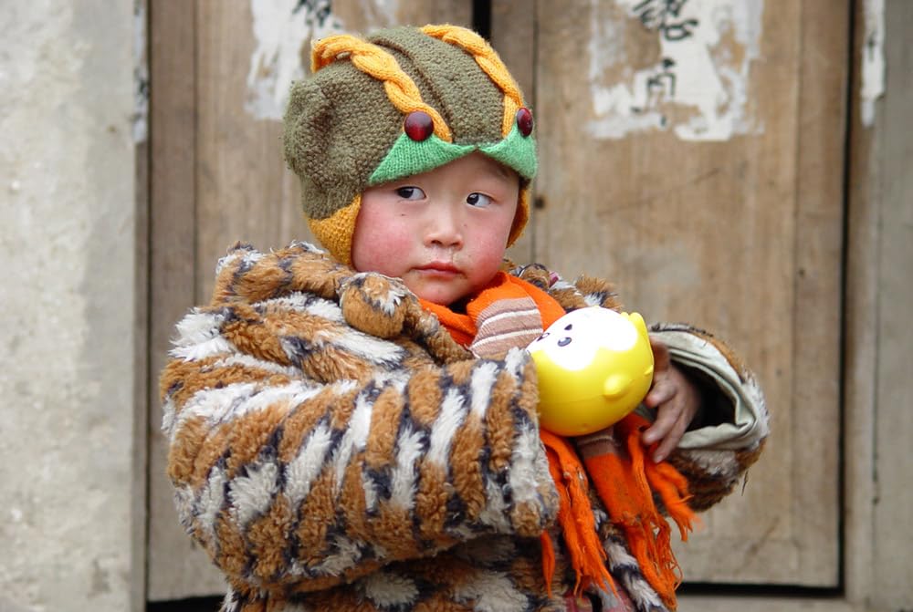 中国 エイズ孤児の村の画像