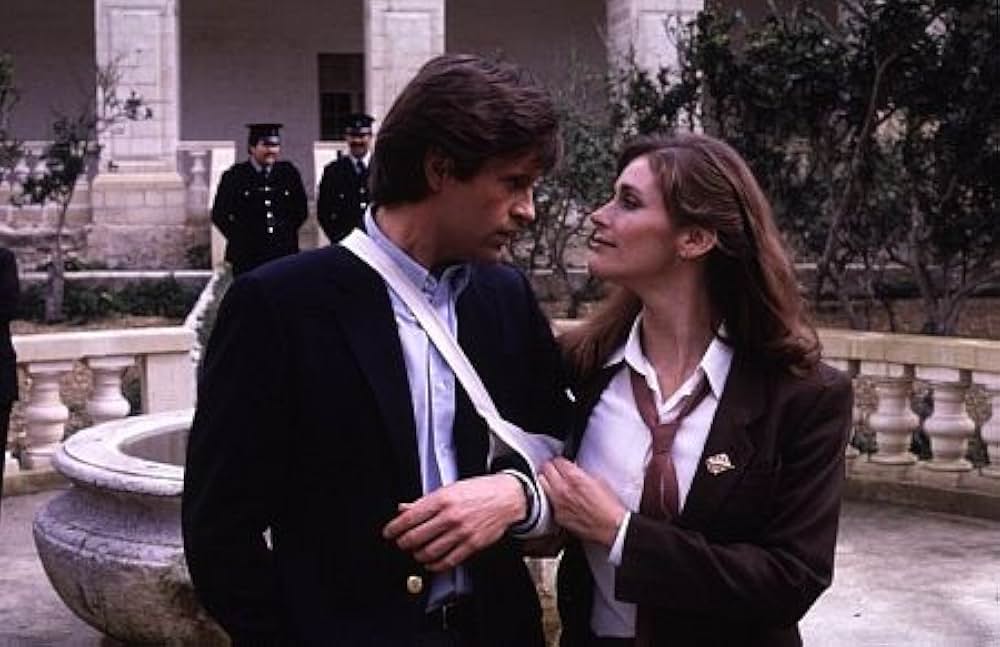 トレンチコート／危険な追跡の画像