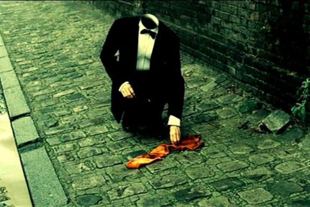 頭のない男の画像