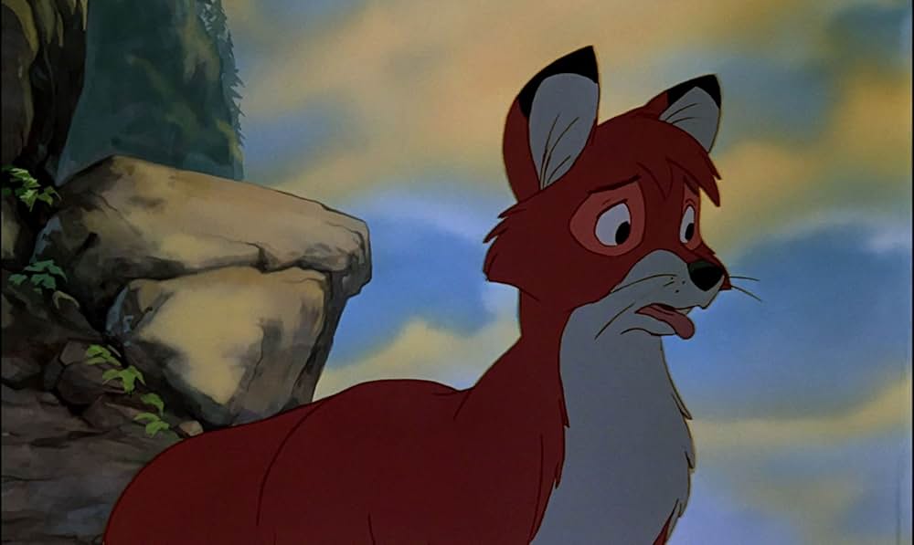 「きつねと猟犬」の画像