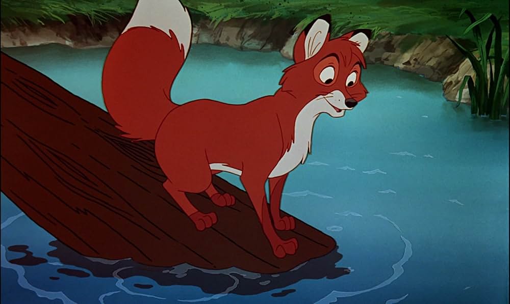 「きつねと猟犬」の画像