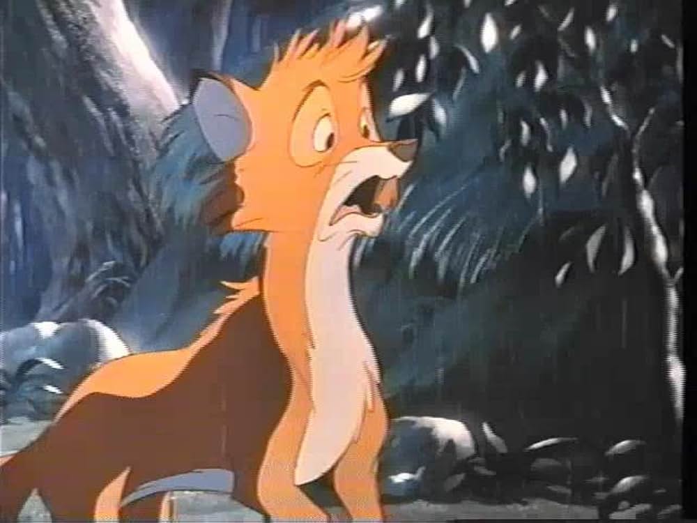 「きつねと猟犬」の画像