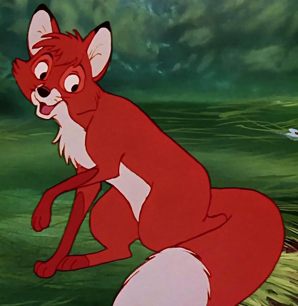 「きつねと猟犬」の画像