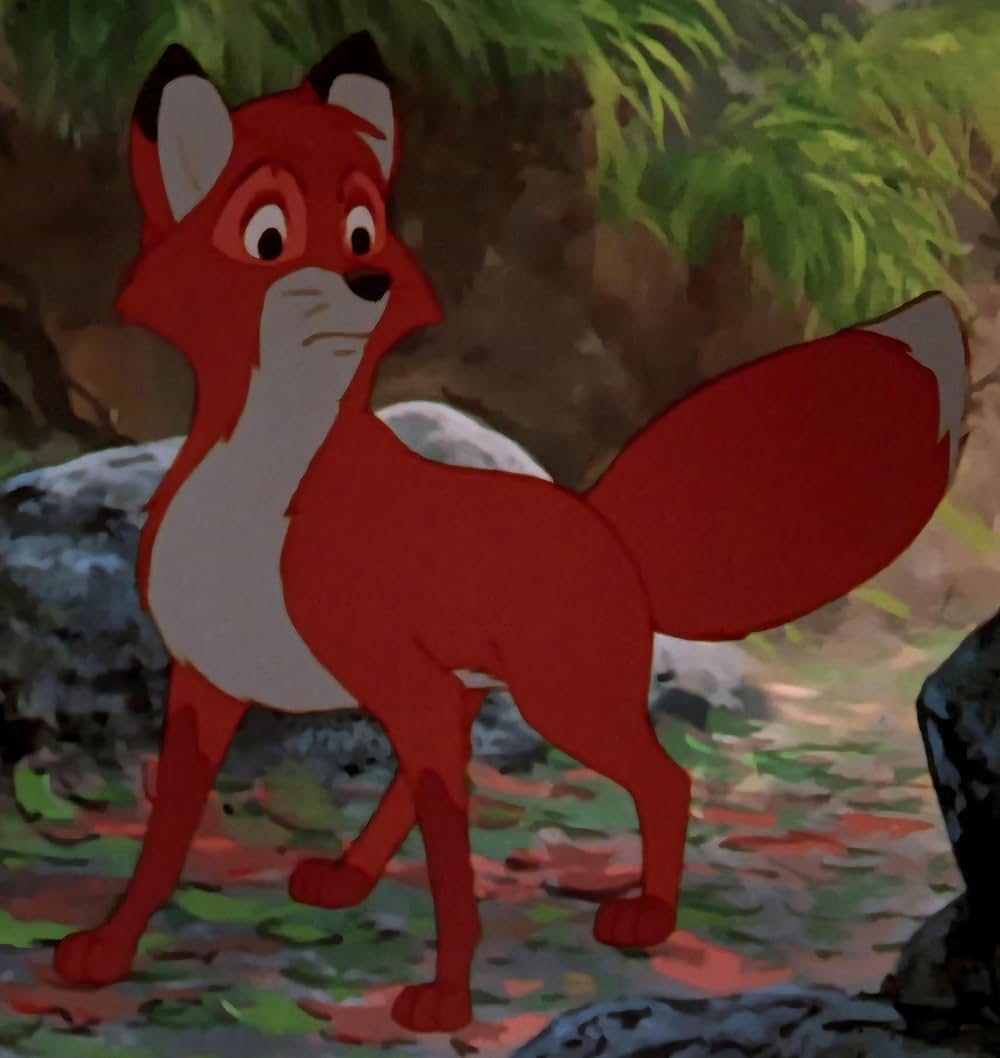 「きつねと猟犬」の画像