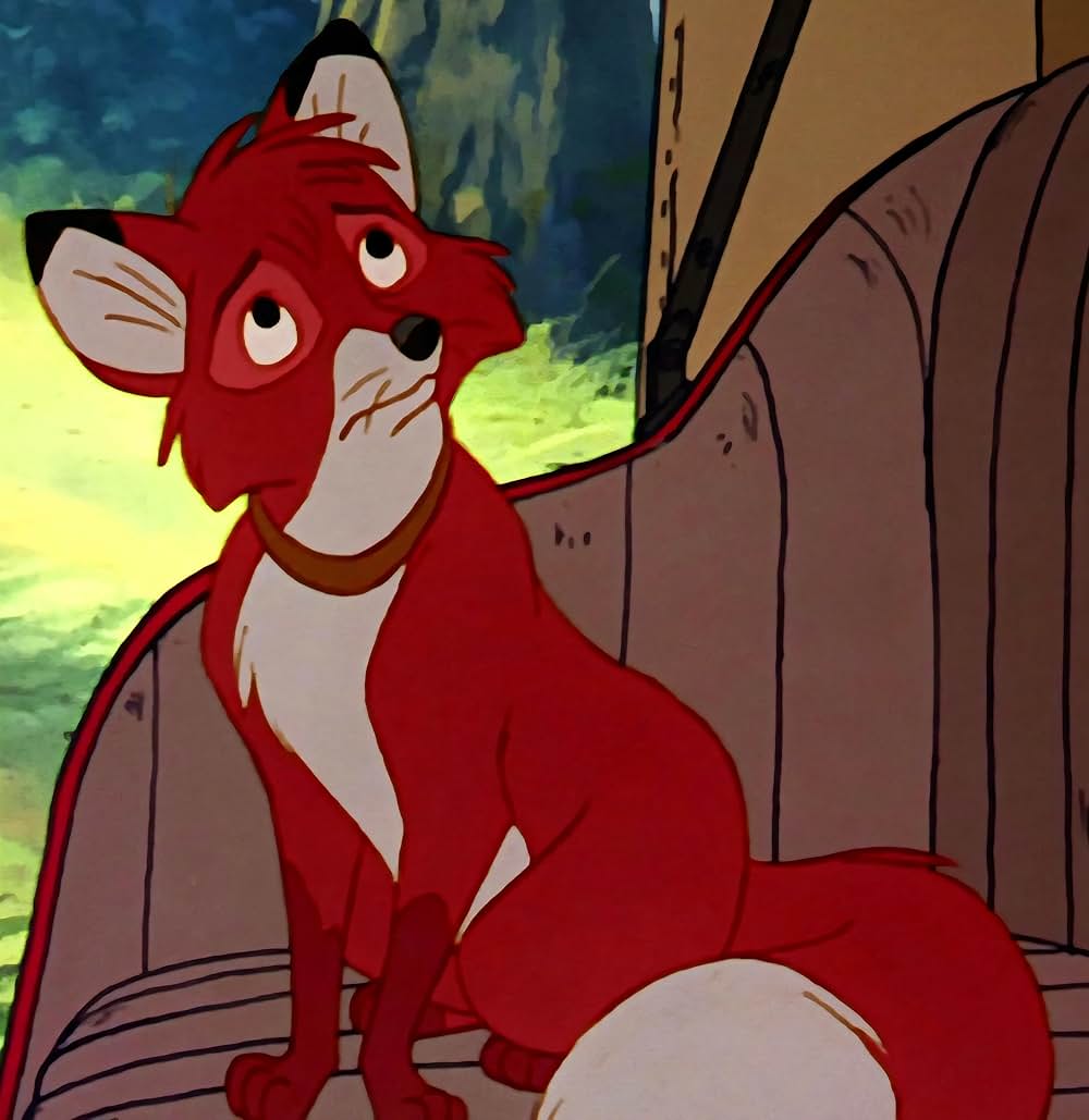 「きつねと猟犬」の画像