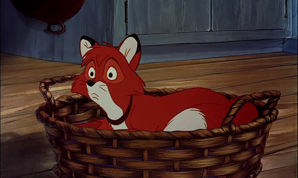 「きつねと猟犬」の画像