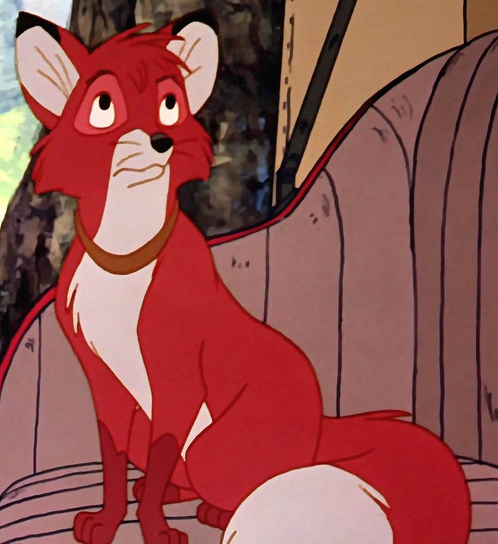 「きつねと猟犬」の画像