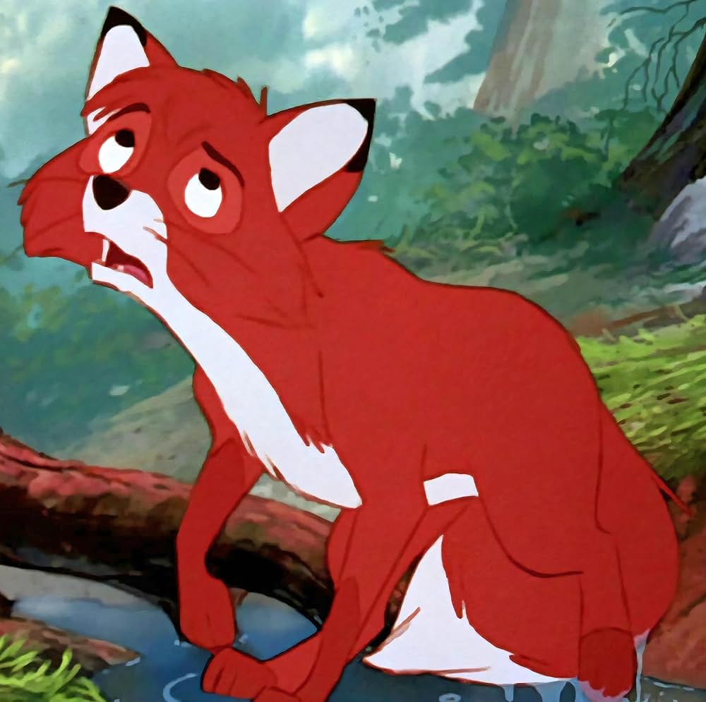 「きつねと猟犬」の画像