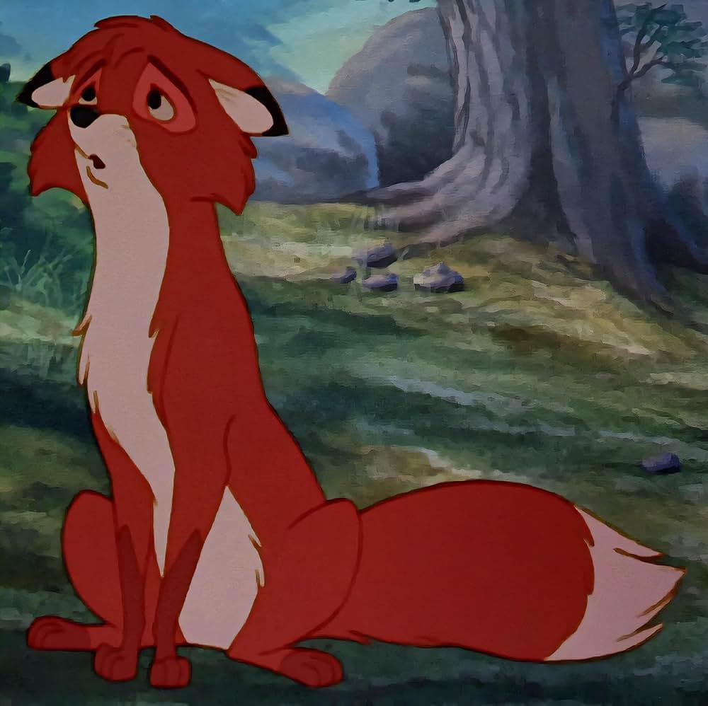 「きつねと猟犬」の画像