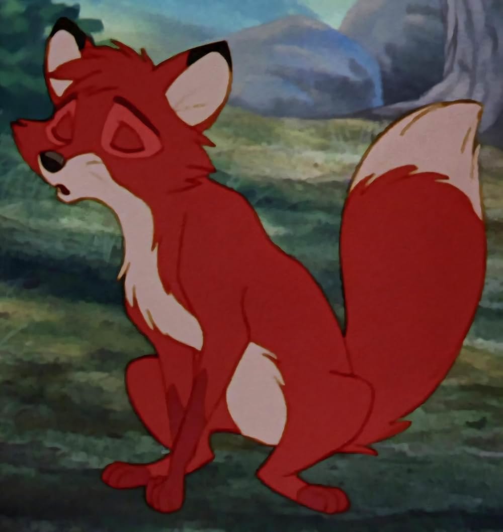 「きつねと猟犬」の画像