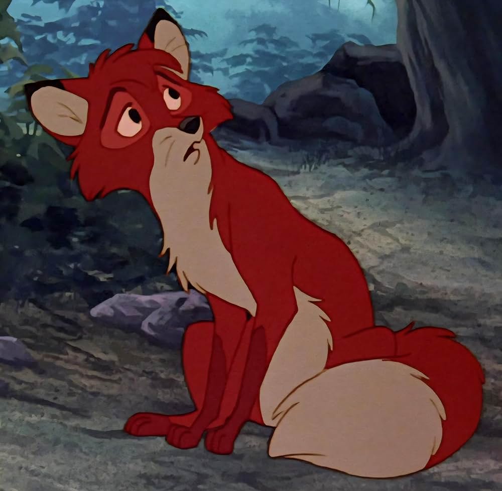 「きつねと猟犬」の画像