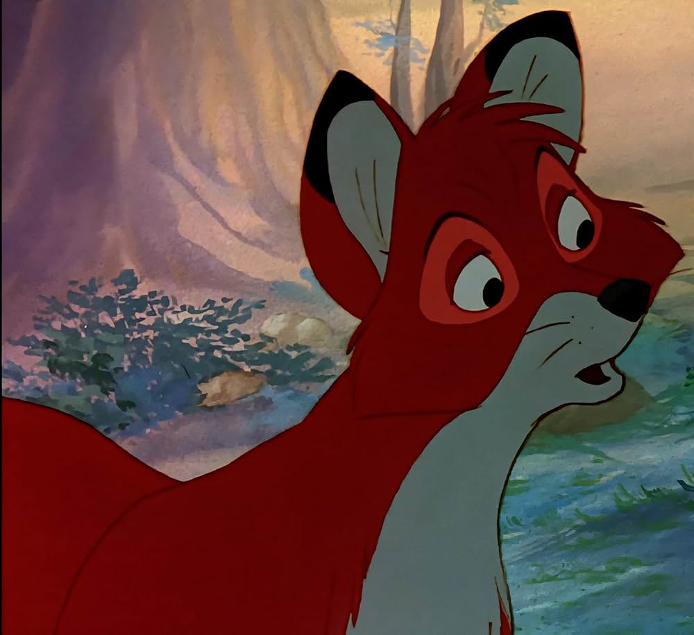 「きつねと猟犬」の画像