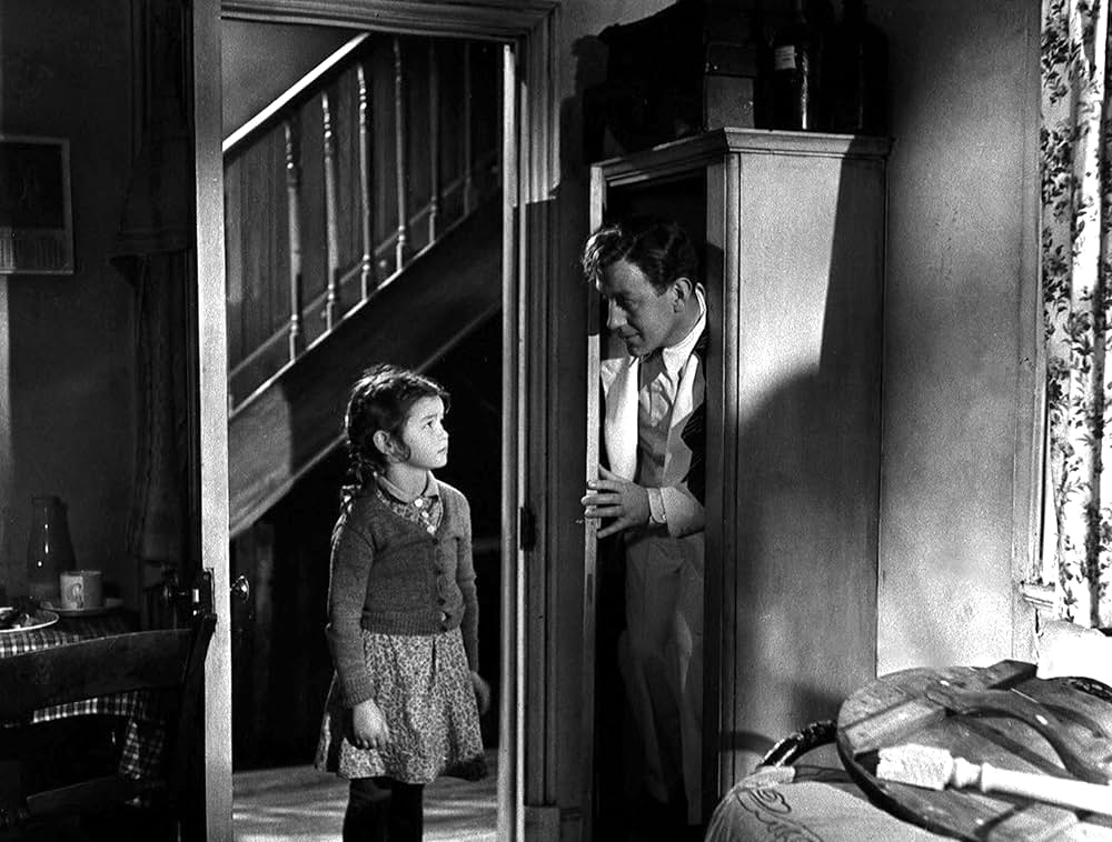 白衣の男の画像