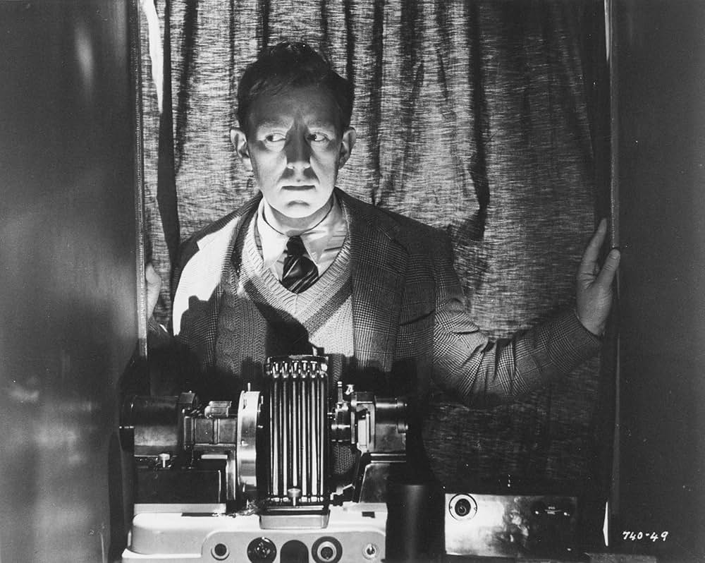 白衣の男の画像