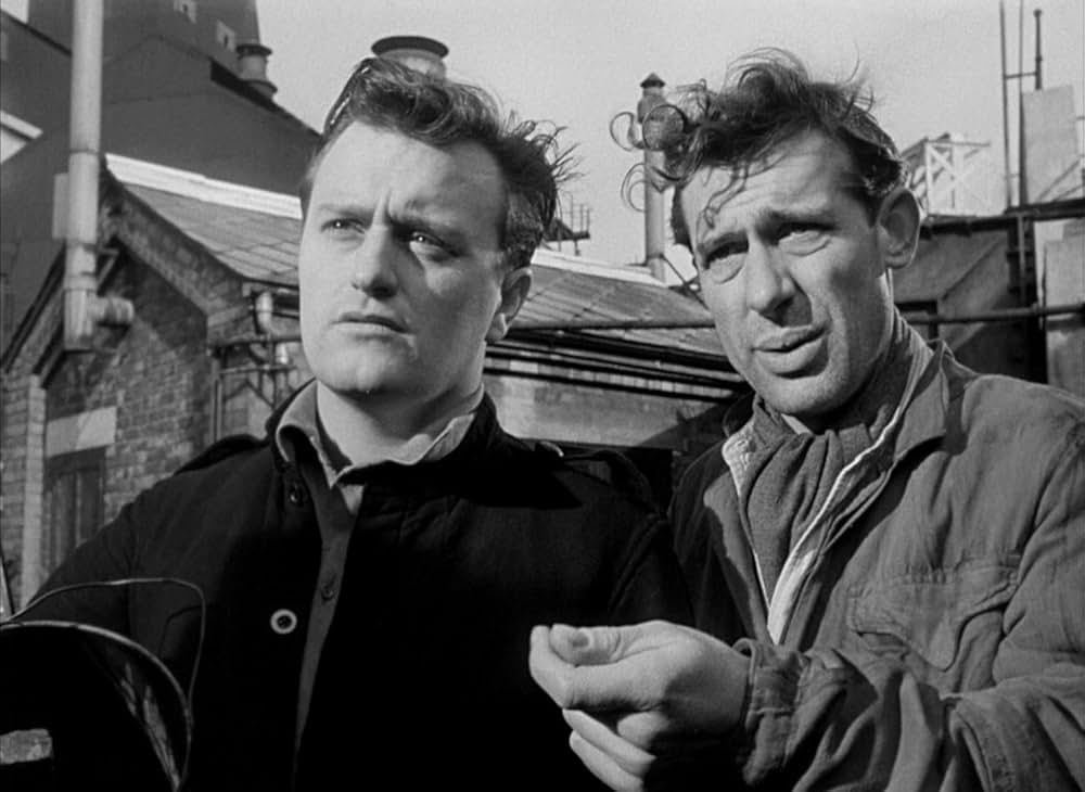 白衣の男の画像