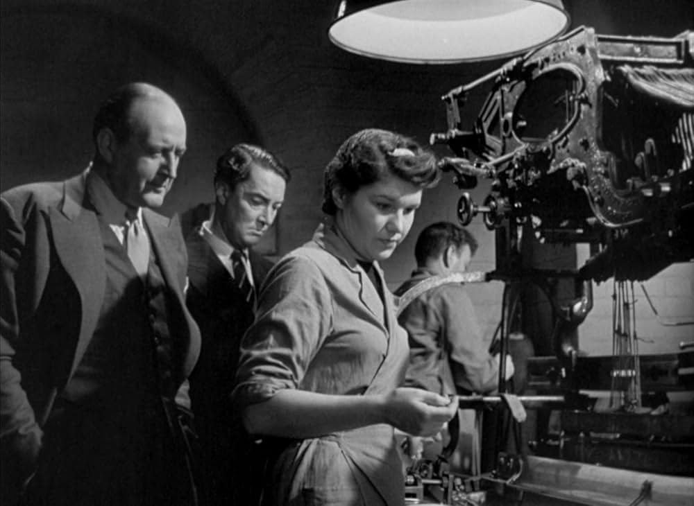 白衣の男の画像