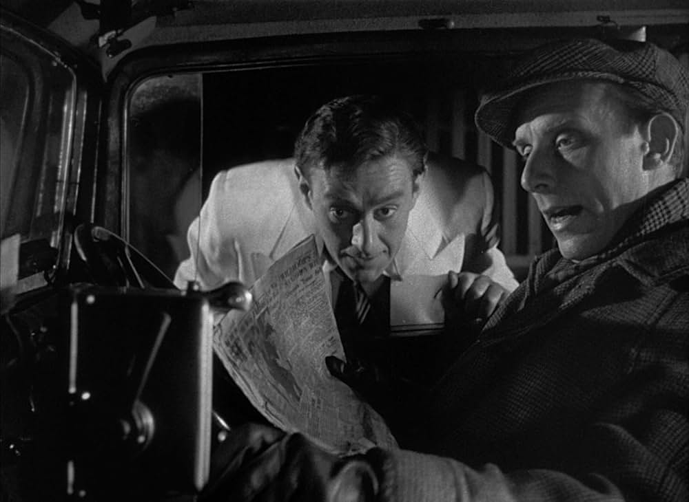 白衣の男の画像