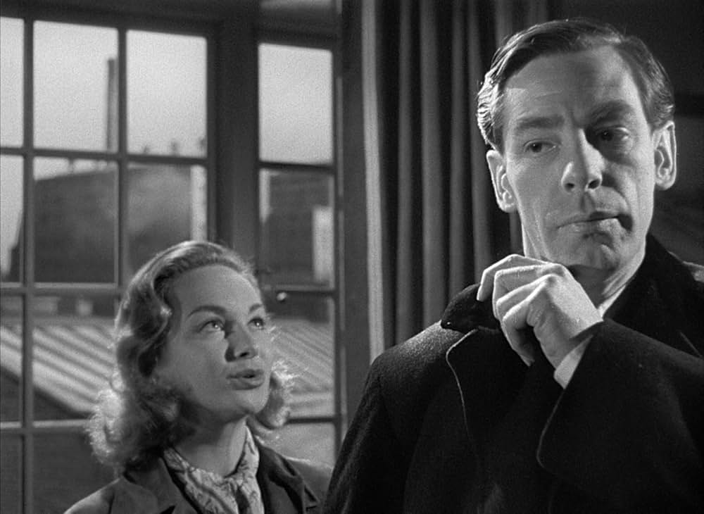 白衣の男の画像