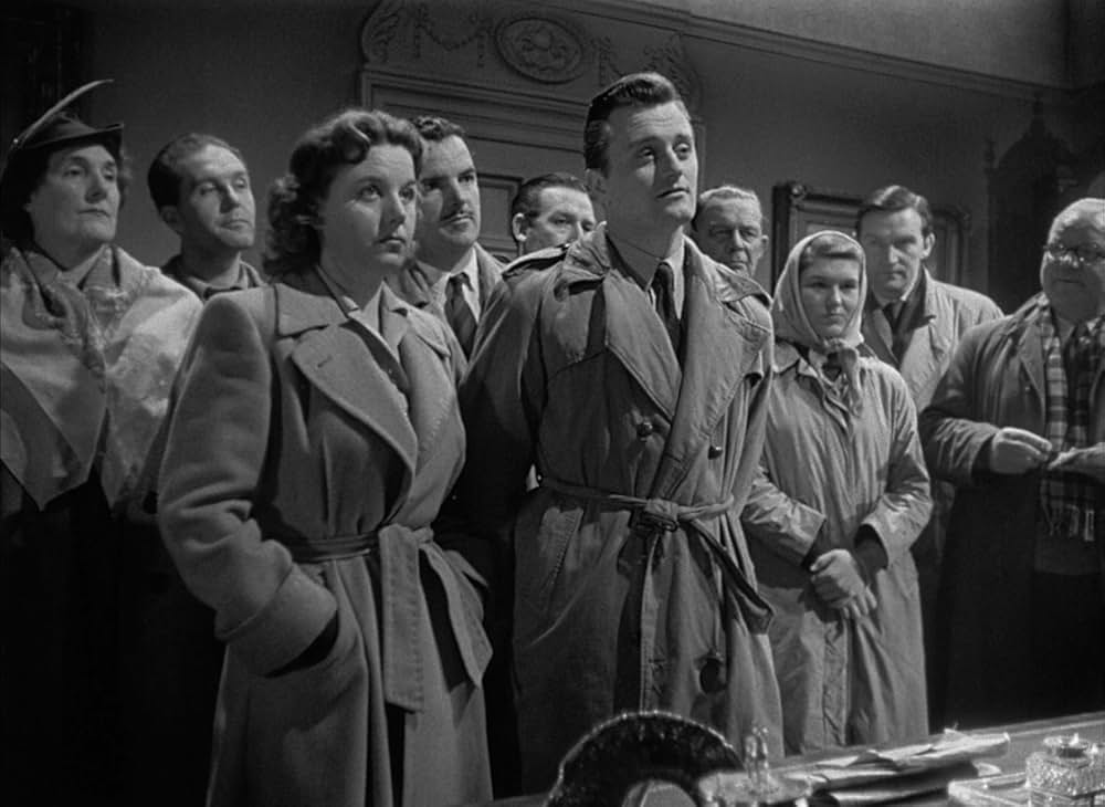 白衣の男の画像