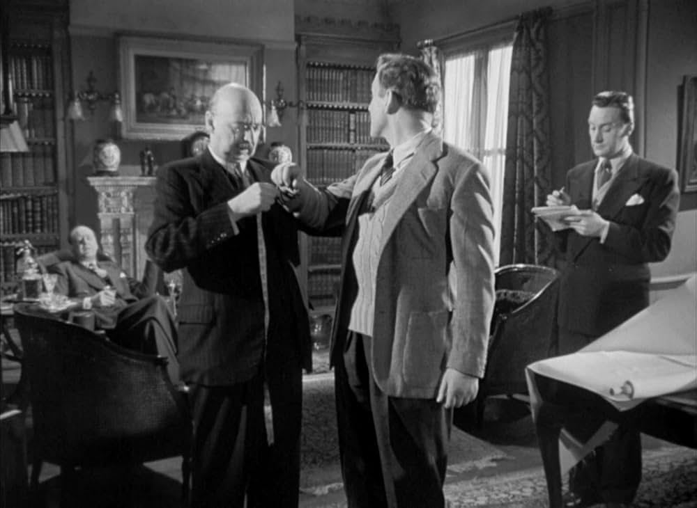 白衣の男の画像