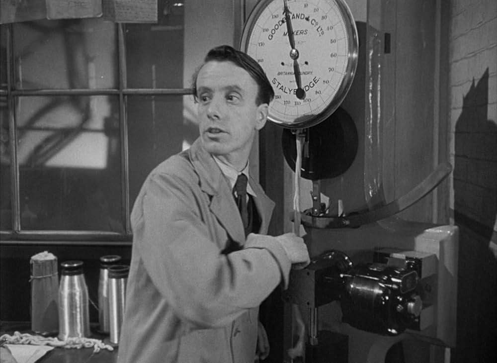 白衣の男の画像