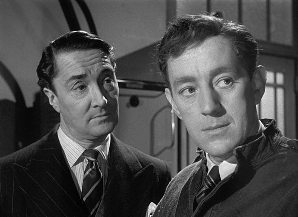 白衣の男の画像