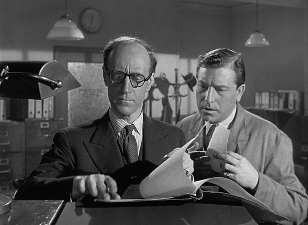 白衣の男の画像