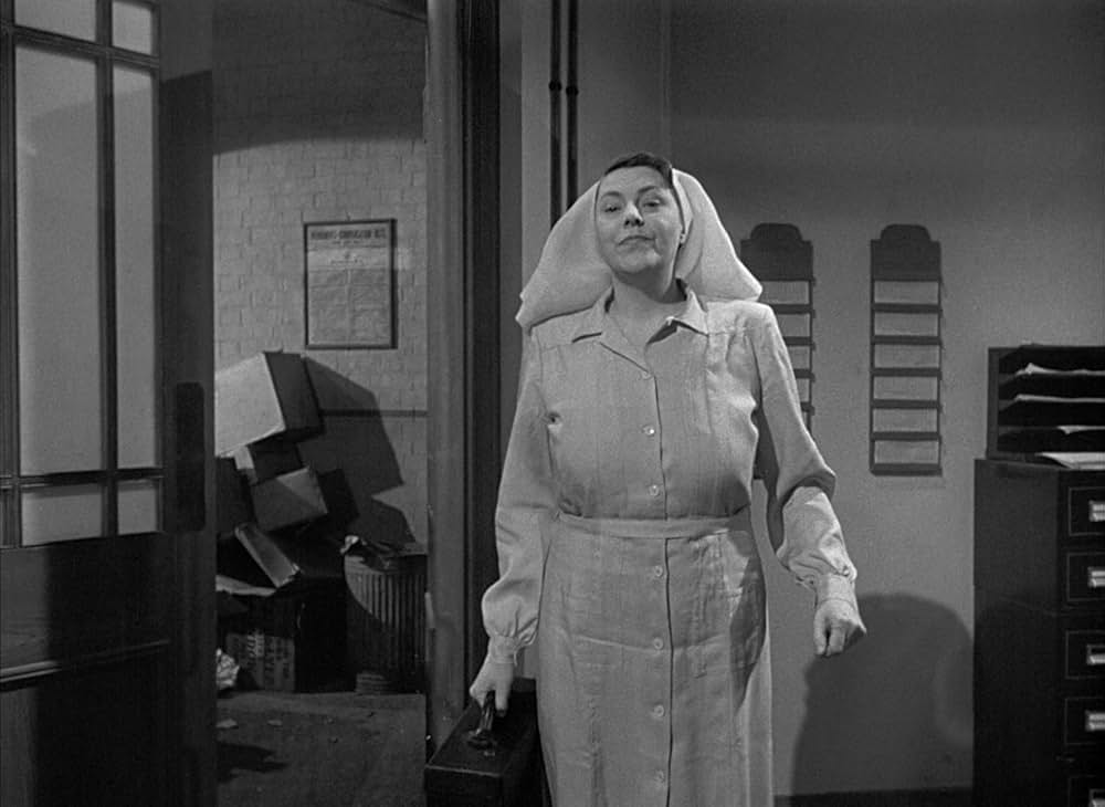 白衣の男の画像