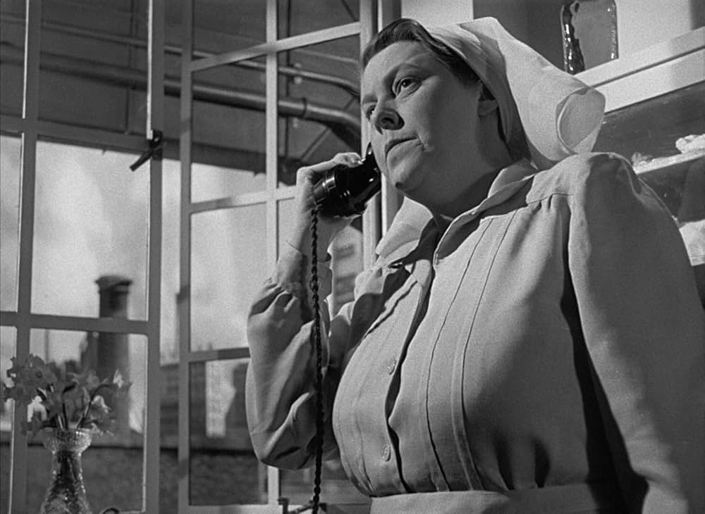 白衣の男の画像