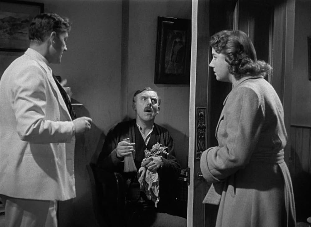 白衣の男の画像