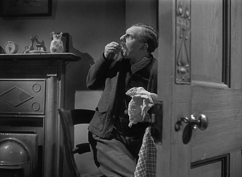 白衣の男の画像