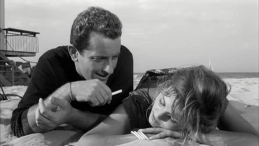 「鞄を持った女」クラウディア・カルディナーレ & リカルド・ガローネの画像