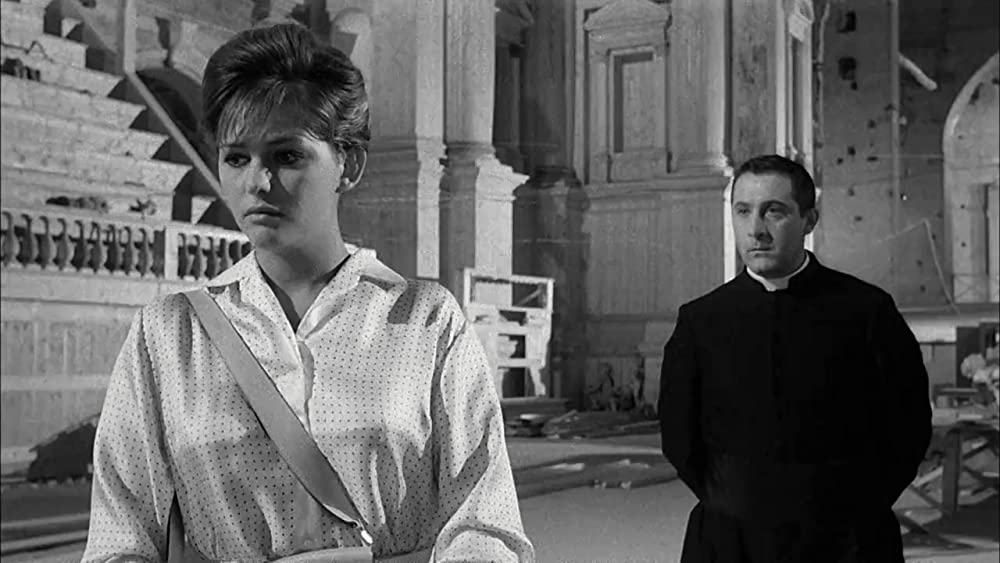 「鞄を持った女」クラウディア・カルディナーレ & ロモロ・バリの画像