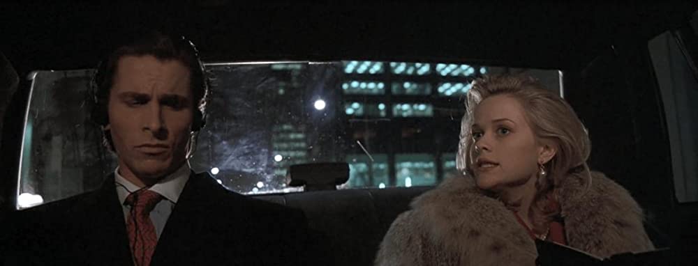 「アメリカン・サイコ」クリスチャン・ベール & リース・ウィザースプーンの画像