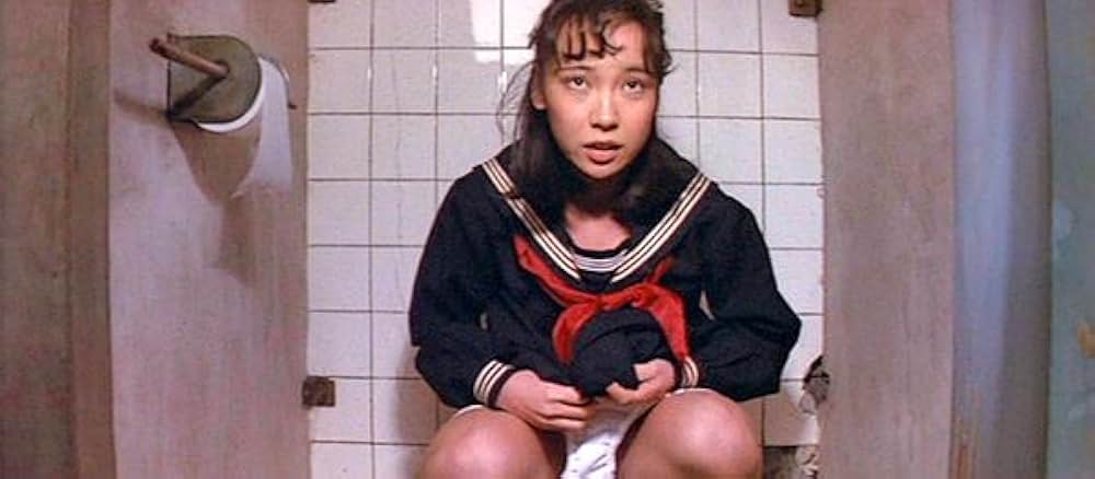 ズームアップ ビニール本の女の画像