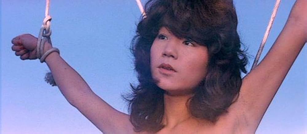 ズームアップ ビニール本の女の画像