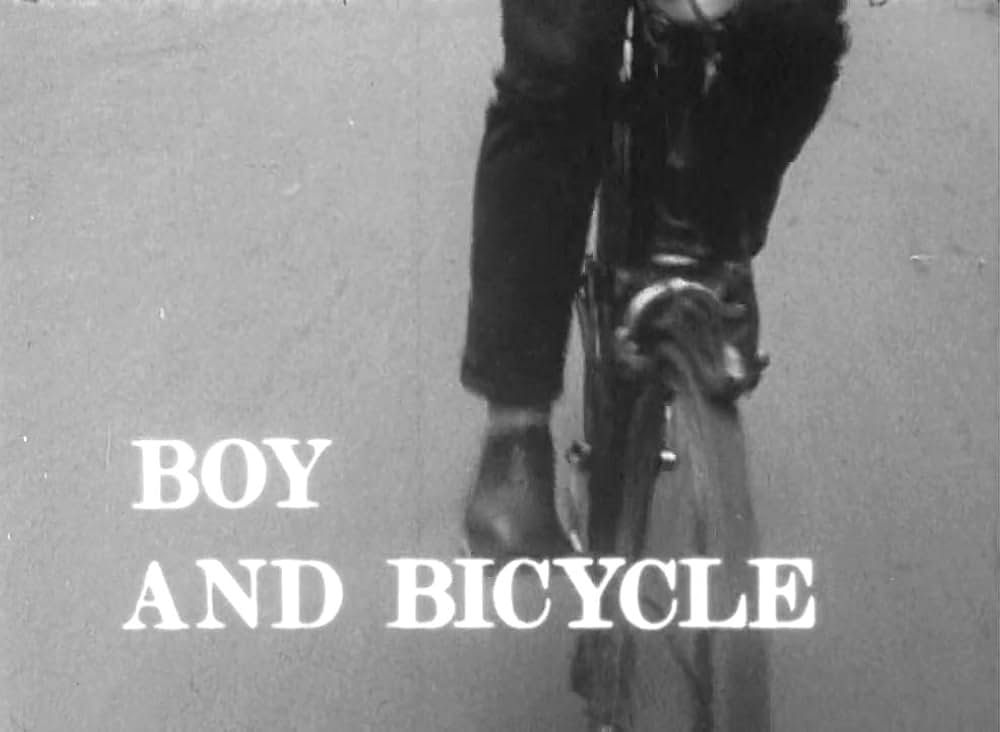 少年と自転車の画像