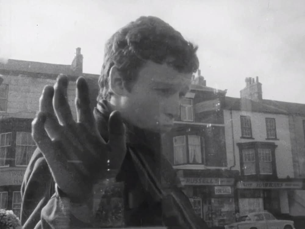 少年と自転車の画像