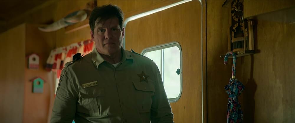 神は銃弾の画像