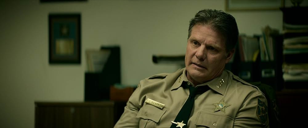 神は銃弾の画像