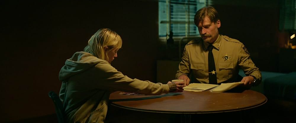 神は銃弾の画像