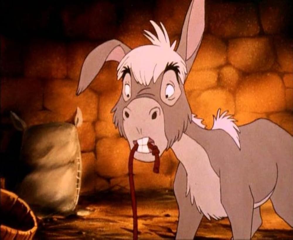 ロバと少年の画像